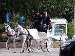 Mourners hang out of cars as they gather for the second funeral on the A66 after Kemi Badenoch condemned the 'obscene' decision to close schools in Middlesbrough early again