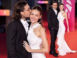 Nicola Peltz turns heads in a white ruffled dress as she and husband Brooklyn Beckham make another PDA appearance to celebrate Faye Dunaway at the Deauville Film Festival