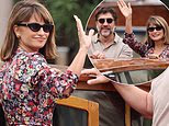 Penelope Cruz stuns in a floral dress as she leaves in a water taxi with Javier Bardem after bursting into tears during a 15-minute standing ovation at the Venice Film Festival
