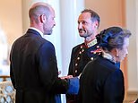 Norway's Haakon greets Prince William as king for the first time at his father's funeral - after the couple spent years together as heirs