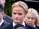 The stepson of the rapist of Norway's new king is shunned by his step-grandmother, Queen Sonja, at her husband's funeral... and gets a look from the bishop